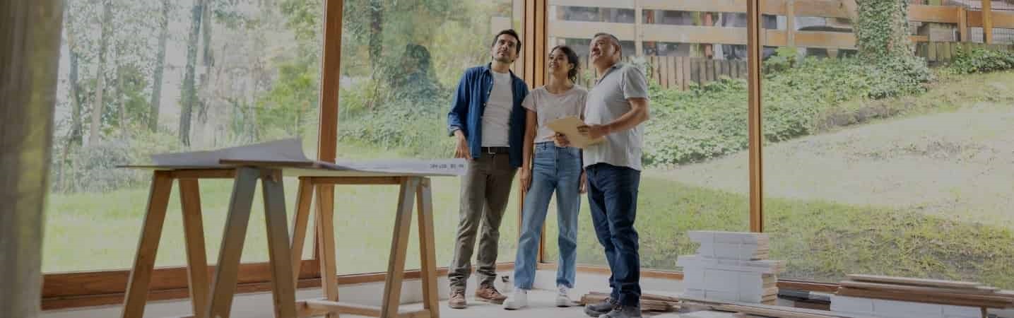 Couple discussing home improvements with contractor